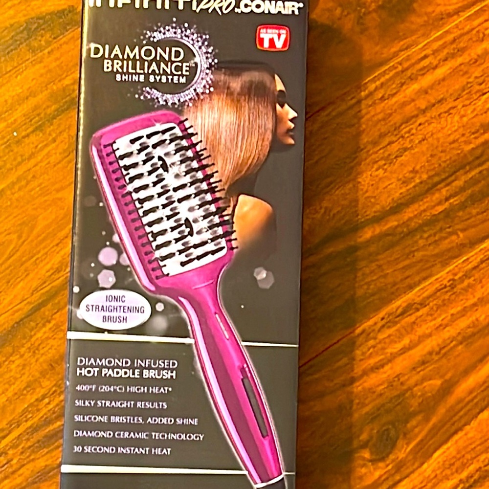 Electric Hair Brush by  Conair